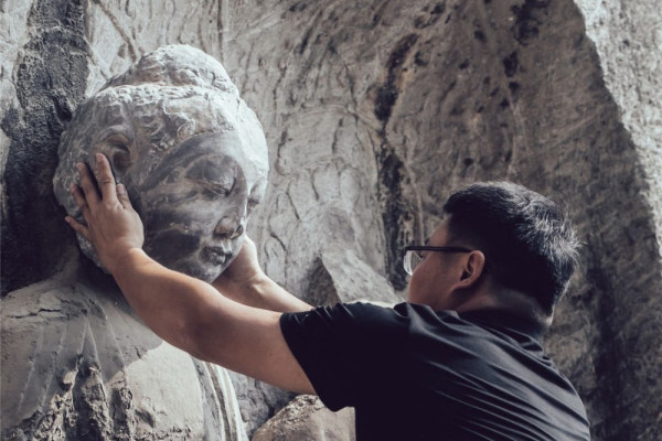 央视13台《朝闻天下》：龙门石窟一佛像实现身首合璧