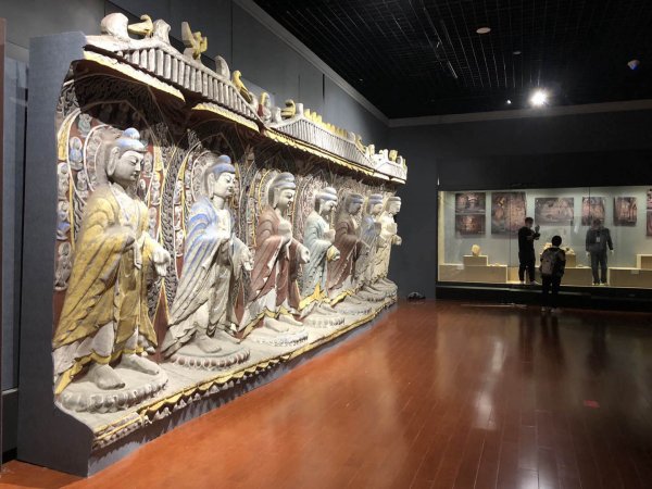 谁促成了敦煌、云冈、龙门三大石窟联展?